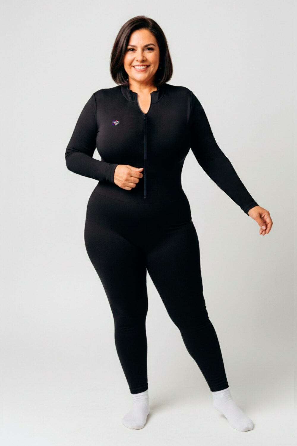 Enterizo negro Dulce ZipLong con manga larga, pierna larga y cierre frontal.