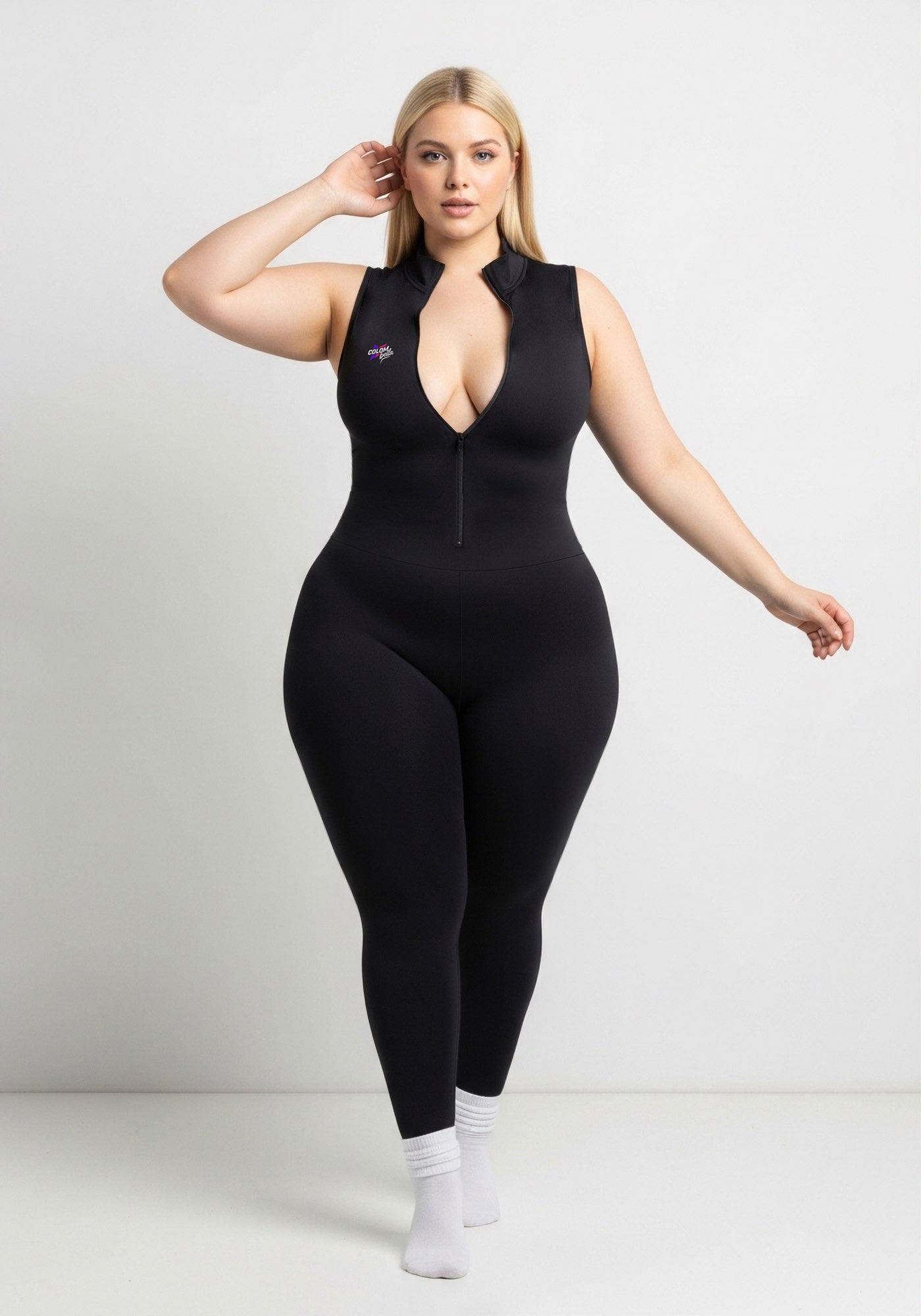 Enterizo negro Encanto ZipSleeveless con manga sisa, pierna larga y cierre frontal.